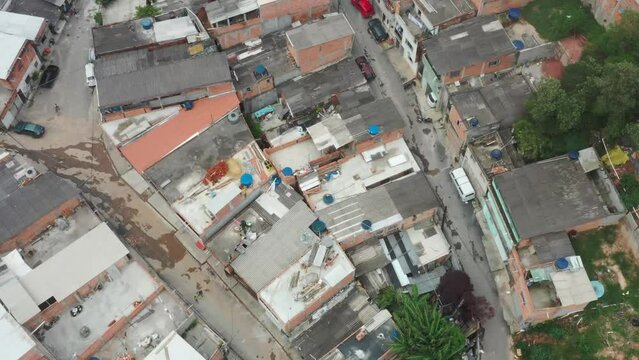 An aerial shot of houses in a favela area. It is basically a congested residential place which has been captured through drone