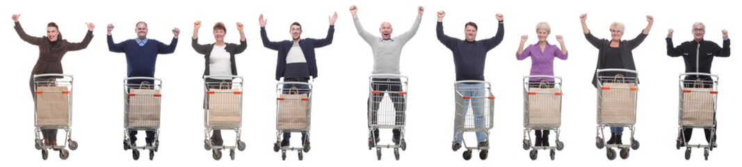 group of people with cart raised their hands up