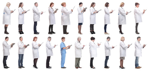 Obraz premium full length group of doctors with notepad isolated