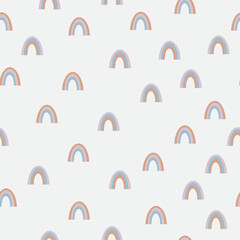 seamless rainbow pattern. white background. cute small rainbows . vector texture. trend print for textiles and wallpaper.