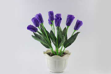 closeup Indonesian home made imitation purple flower made from papper and plastic