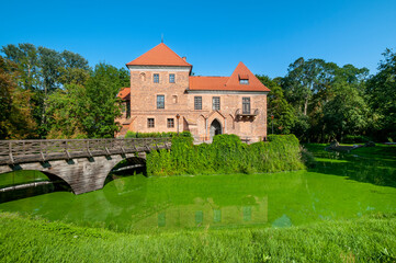 Naklejka premium Oporowski Castle build in the Gothic style in the years 1434 - 1449. Oporow, Lodz Voivodeship, Poland