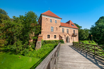 Fototapeta na wymiar Oporowski Castle build in the Gothic style in the years 1434 - 1449. Oporow, Lodz Voivodeship, Poland