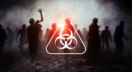 Crowd of zombies and biohazard sign.