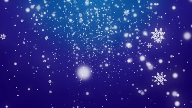 上から雪と雪の結晶が舞う　背景青