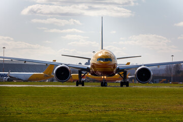 Naklejka premium G-DHLY a 777 taxing out for take off at EMA - stock photo.jpg