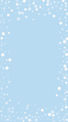 Snowfall overlay christmas background. Subtle flying snow flakes and stars on light blue winter backdrop. Festive snowfall overlay. Vertical vector illustration.