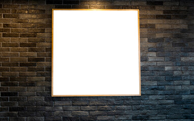 Blank picture frame on brick wall