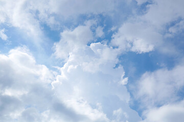 Naklejka na ściany i meble Beautiful blue sky covered with clouds as background