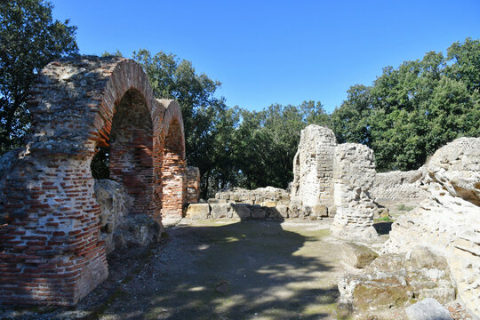 An arch among the ruins of Cuma, an ancient city near Naples, Italy.
