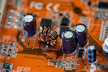 colored motherboard lies on the table completely covering it.