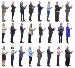 Fototapeta premium group of successful people with notepad in hands isolated