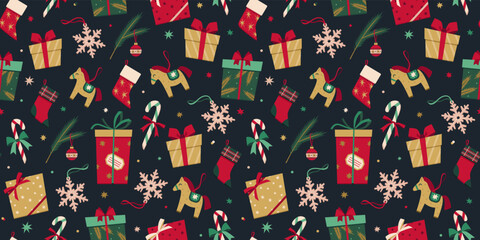 Vector seamless pattern with Christmas decoration in flat style. New Year stylish background of Christmas gift boxes, presents, socks, toys, candy cane, snowflake, fur tree branch, stars and confetti.