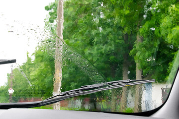 Rear view from inside mirror rain water drops falling on car window windshield glass