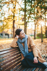Fototapeta premium Pensive woman in the autumn park