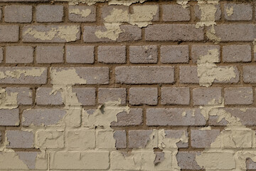 an old grey brick wall