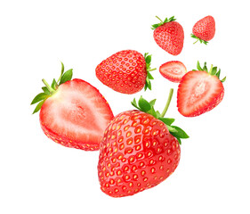 Strawberry with cut in half levitate isolated on white background. Clipping path.