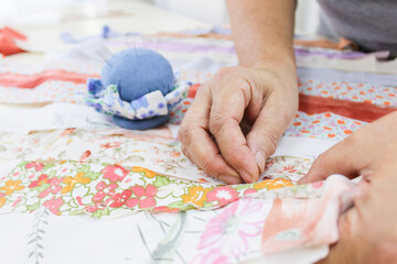 Obraz na płótnie Canvas woman working with textile materials