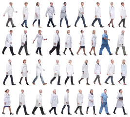 group of doctors in motion isolated on white