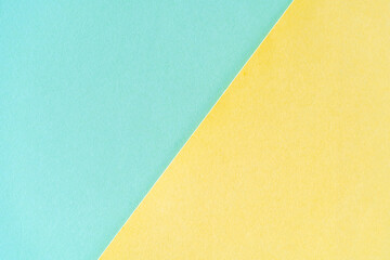 light blue and yellow vintage background on old retro paper texture