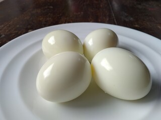 boiled eggs in a white plate