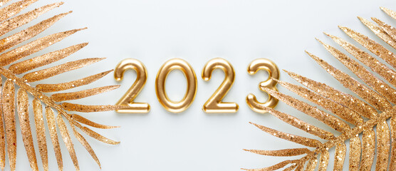 Happy New Year 2023 poster. Christmas background with gold 2023 numbers.