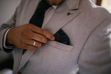 Costume details of the groom