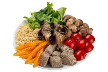 On a round plate porridge, fried eggplant and mushrooms, vegetables and pieces of meat, on a white background, isolate