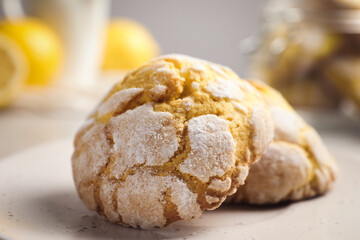 Fresh delicious lemon cookies on plate, closeup