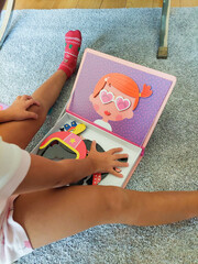 girl playing dress up at home one autumn afternoon