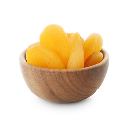 Wooden bowl with tasty dried apricots isolated on white
