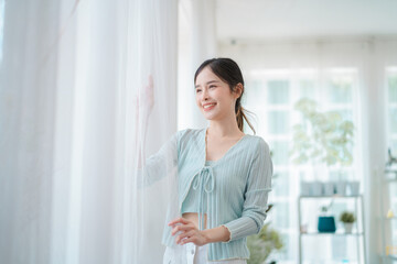 portrait of beautiful young asian woman, Closeup face of a pretty asian model looking at window.