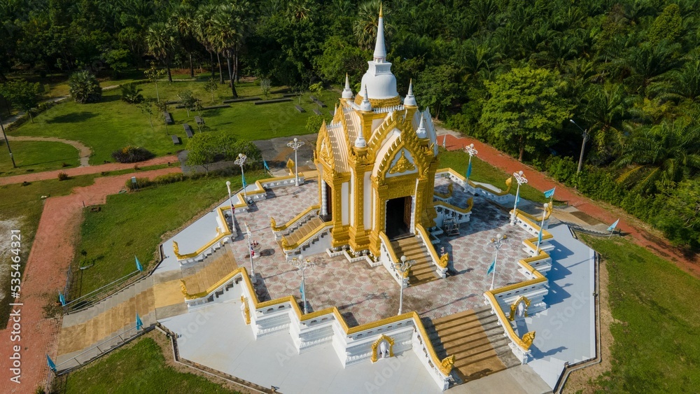 Sticker aerial view of beautiful tropical park with pillar shrine in khanom city, thailand