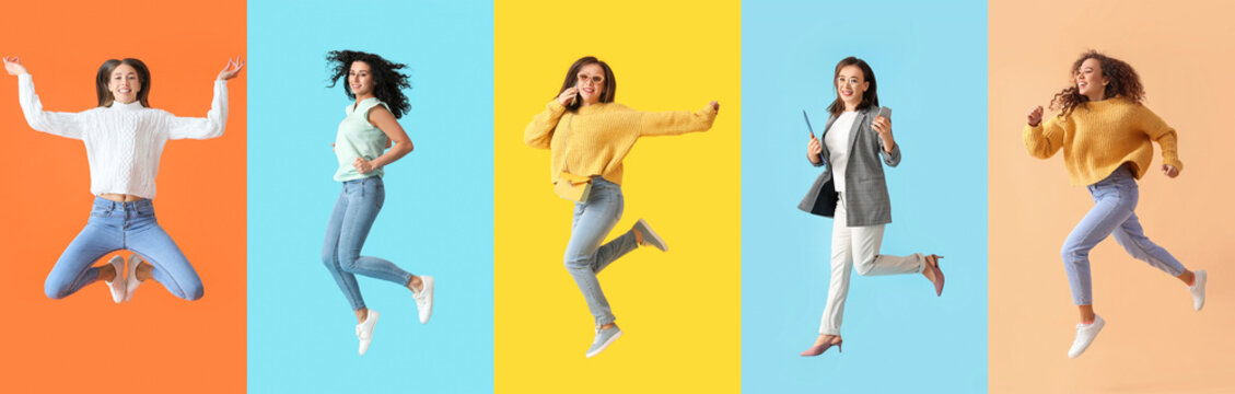 Group of happy jumping women on color background © Pixel-Shot