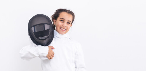 Little girl fencer with epee and mask