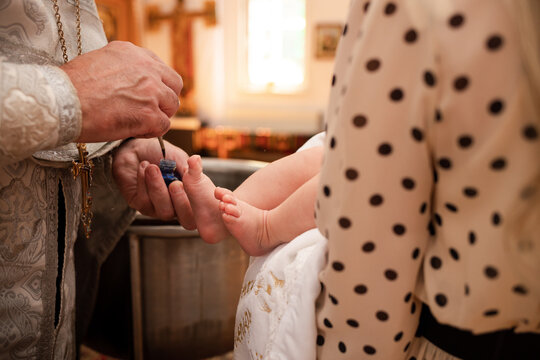Vinnytsia, Ukraine - August 10, 2022. Baptism of a child in an Orthodox church