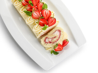 Plate of delicious strawberry roll cake on white background