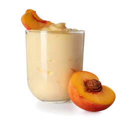 Glass of tasty vanilla pudding and peach on white background