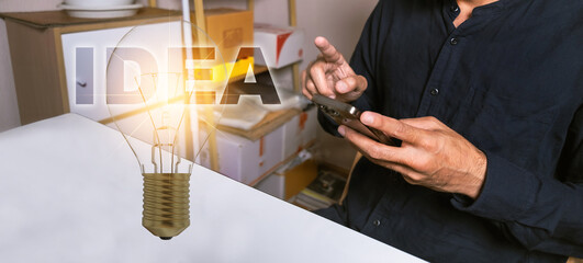 Asian man working 24hr business laptop AI UI interface Object manufacturing industry technology Product export and import future Robot cyber warehouse Arm mechanical control future data technology