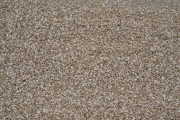 Fine gravel beach, close up of fine pebble beach on Croatian Mediterranean coast. Beautiful image background.