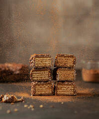 Chocolate candy with nuts and cocoa levitation 