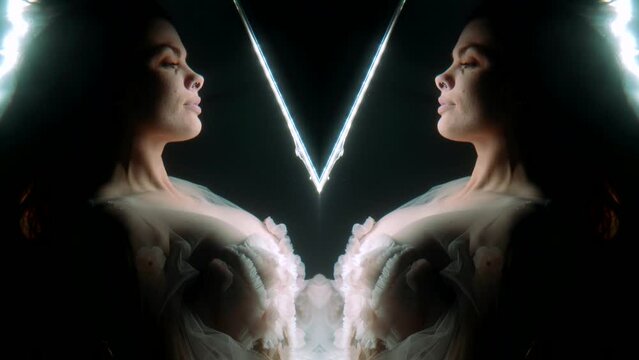 magical underwater portrait of beautiful lady in mysterious depth, double shot in darkness