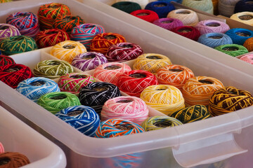 Various coloured spools of thread