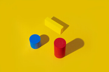 Abstract colored geometric shape red and blue on yellow background. Minimal geometric shapes