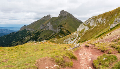 The Belianske Tatras among the visible peaks are Hawran (Havran) (the highest peak in the region) and Placzliwa Skala (Zdiarska Vidla, Placliva skala). - 535495767