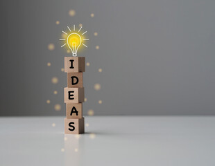 Wooden cube with the word ideas on surface. Creative and inspiration concept.
