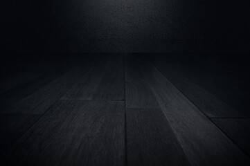 Black wood planks with light in the dark. Black wood background