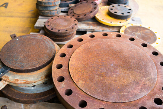 Inlet and outlet covers of various high-pressure tanks used in petroleum applications.