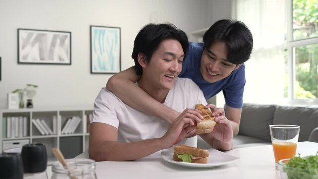 Young Asian gay couple in a romantic mood. LGBT couple showing love and affection.