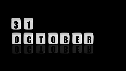 October 31th. Day 31 of month, Calendar date. White cubes with text on black background with reflection. Autumn month, day of year concept